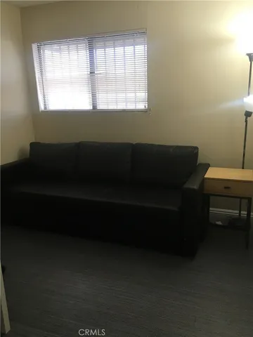 a room with a table and chairs