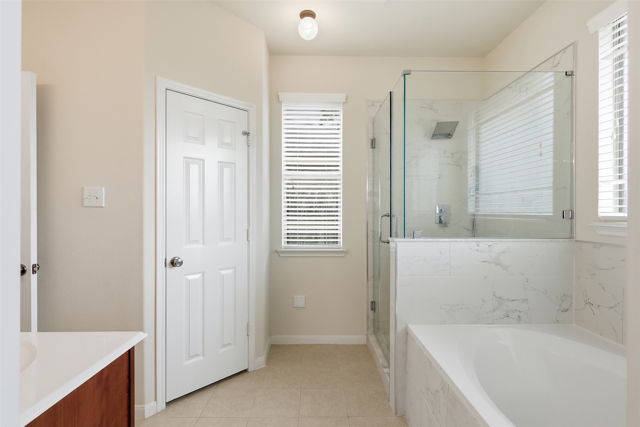 1911 Vale Brook Drive Spring, TX 77373 - Photo 15 of 27 Start and end your day in the spacious ensuite featuring ample vanity space and convenient storage.