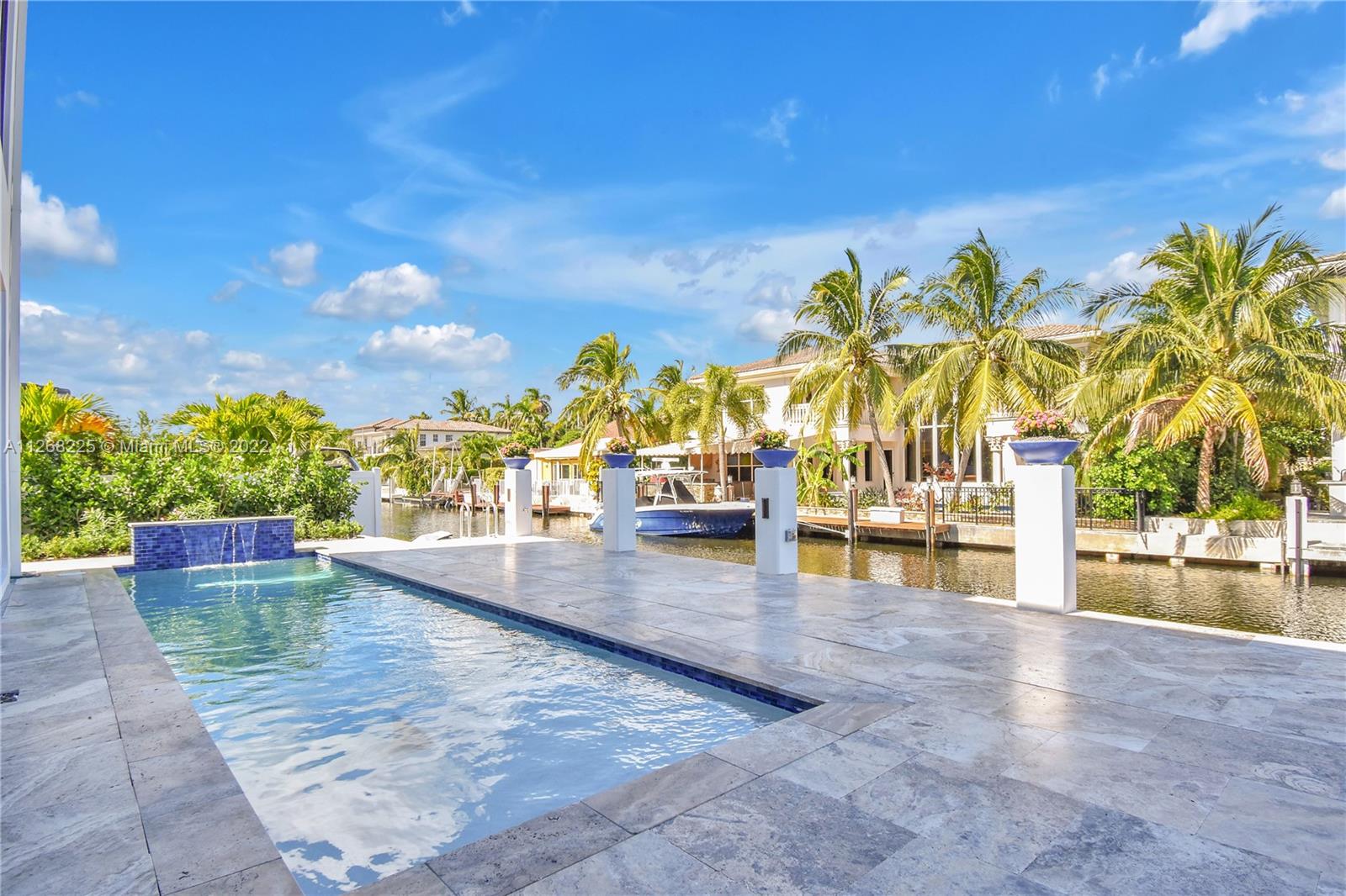 805 Northeast 70th Street Boca Raton, FL 33487 - Photo 4 of 63 a view of outdoor space with seating