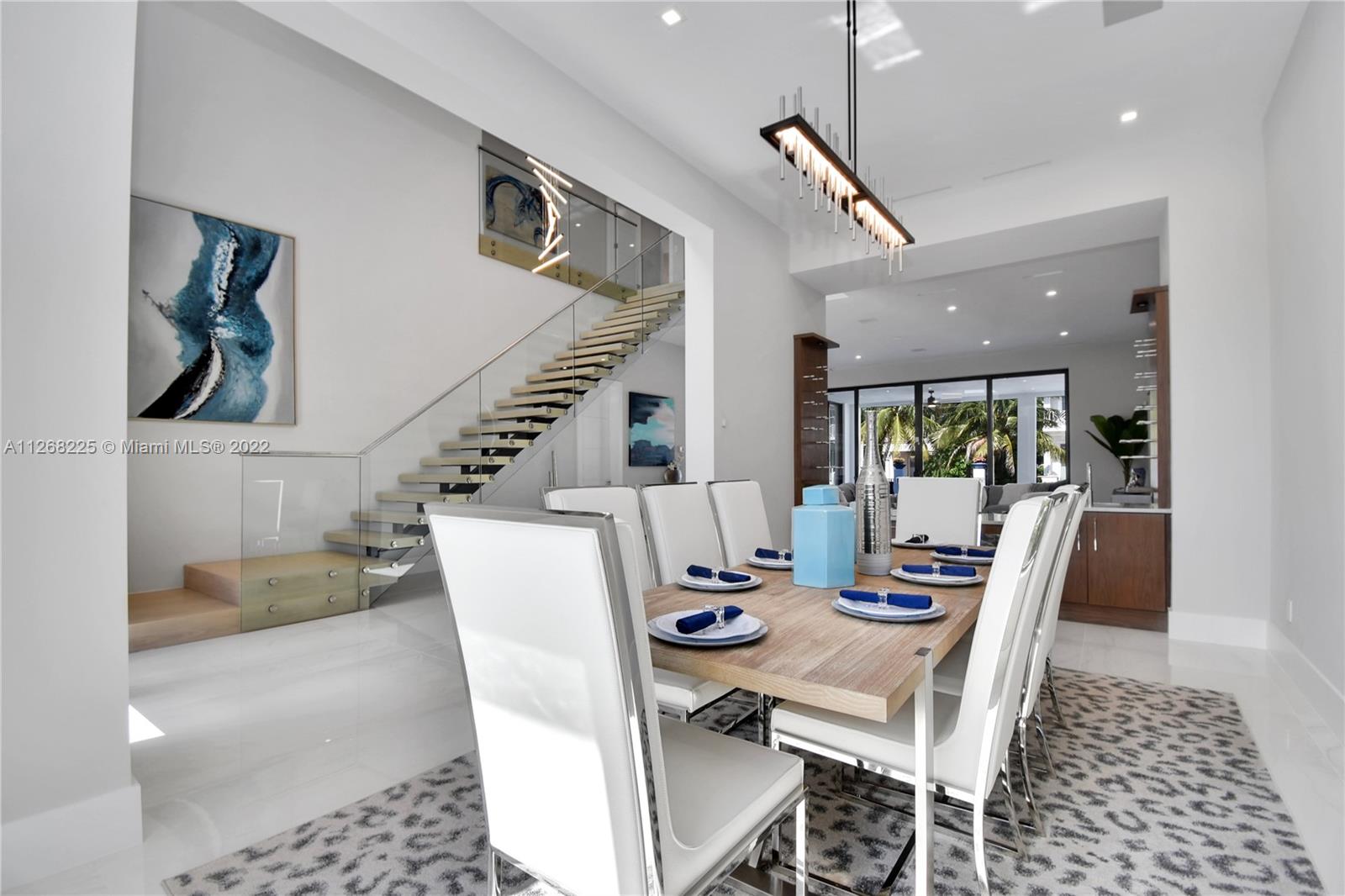 805 Northeast 70th Street Boca Raton, FL 33487 - Photo 41 of 63 a view of a dining room with furniture