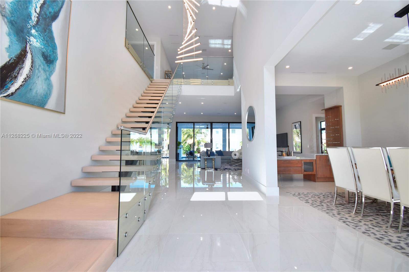 805 Northeast 70th Street Boca Raton, FL 33487 - Photo 5 of 63 a view of entryway and hall