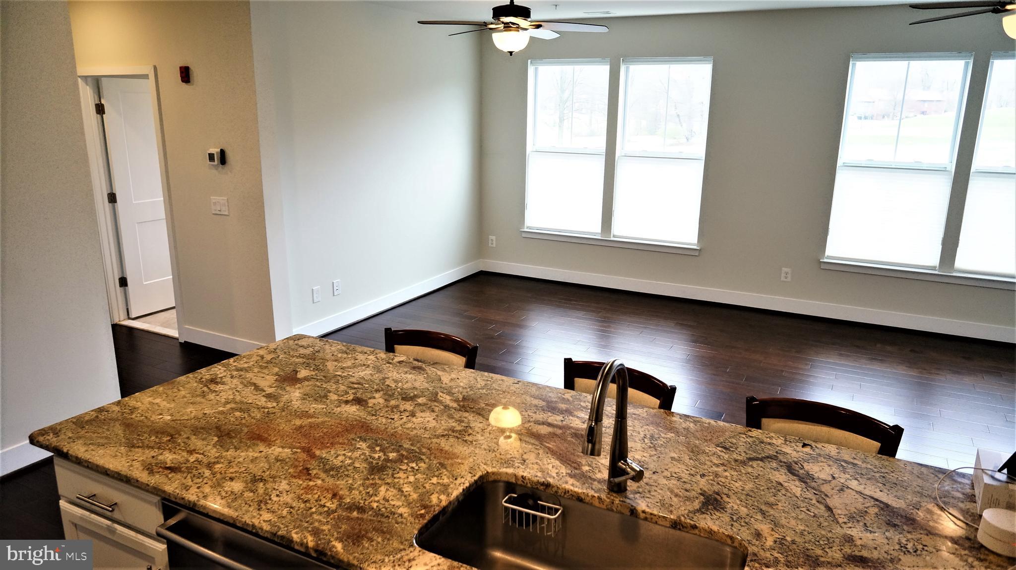 1951 Reston Vly Way, Unit 10 Reston, VA 20191 - Photo 39 of 50 a bathroom with a sink and a mirror
