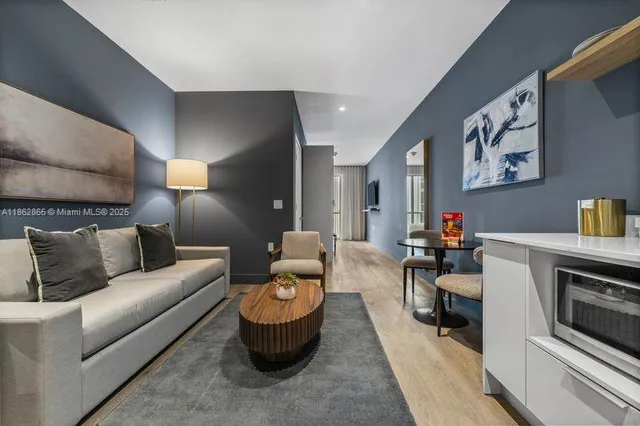 a living room with furniture and a couch