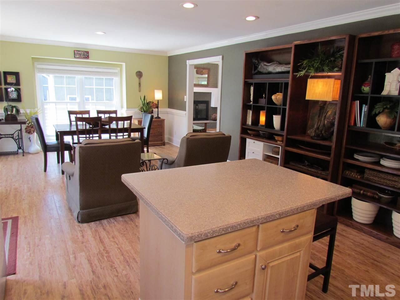 8412 Two Courts Drive Raleigh, NC 27613 - Photo 12 of 25 a room with furniture and wooden floor