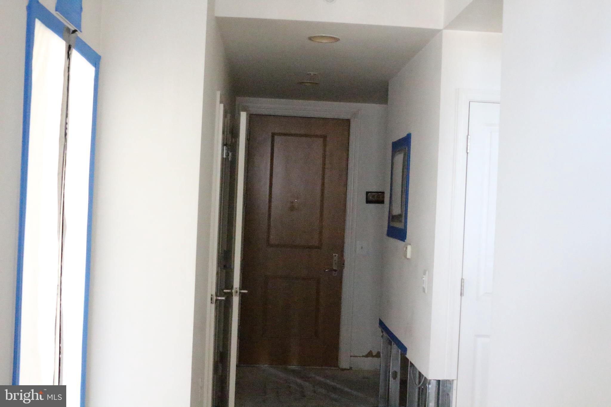 11990 Market Street, Unit 1216 Reston, VA 20190 - Photo 22 of 23 Exit hallway
