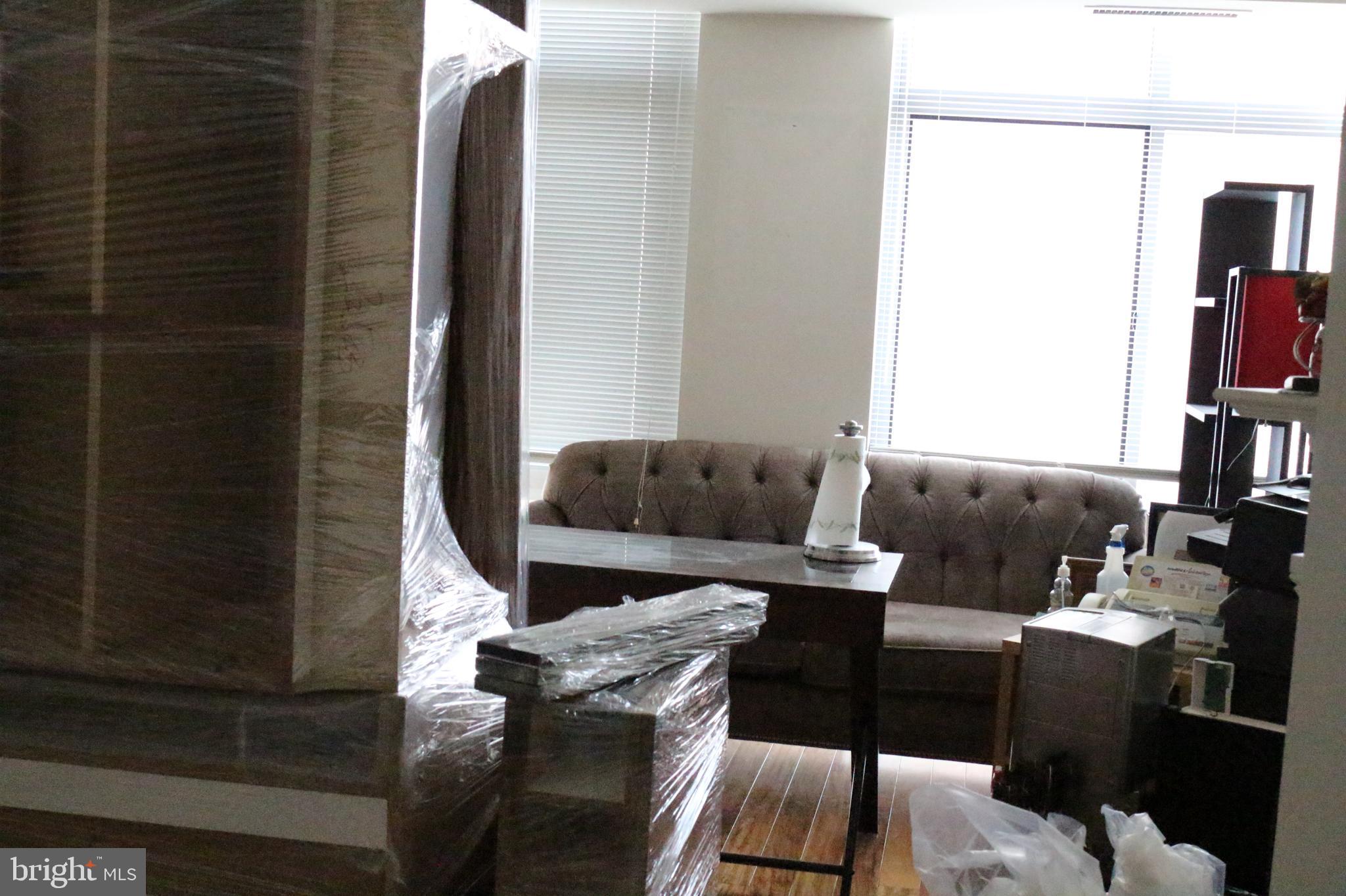 11990 Market Street, Unit 1216 Reston, VA 20190 - Photo 7 of 23 Den/living Room