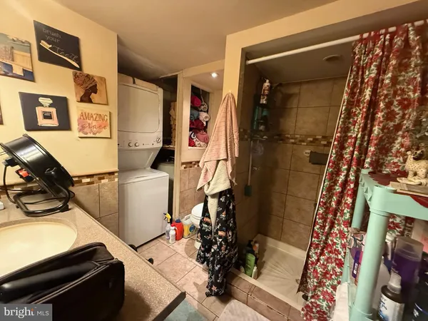 a room with furniture and a potted plant