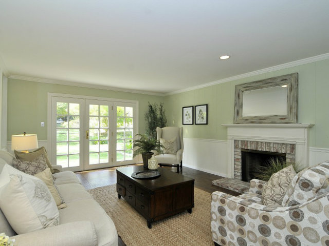 95 Reservoir Road Atherton, CA 94027 - Photo 2 of 10 a living room with furniture window and a fireplace