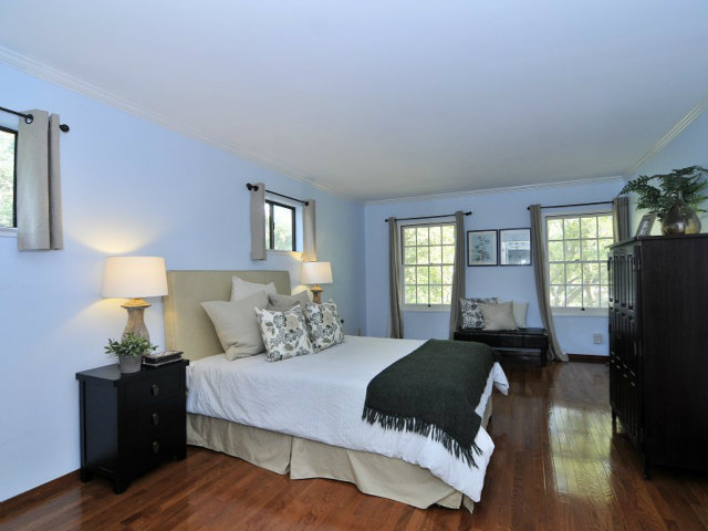 95 Reservoir Road Atherton, CA 94027 - Photo 7 of 10 a bedroom with a bed and a window