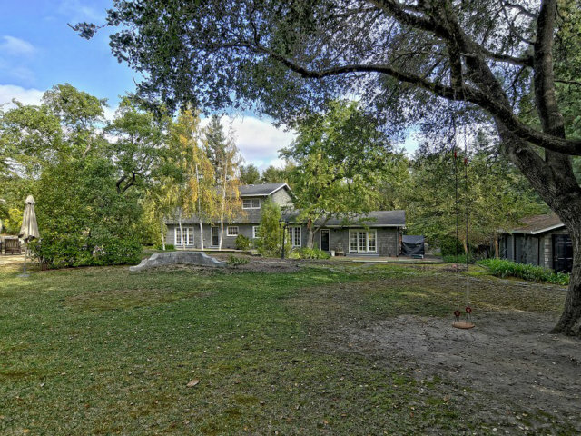 95 Reservoir Road Atherton, CA 94027 - Photo 10 of 10 a view of a big yard next to a house