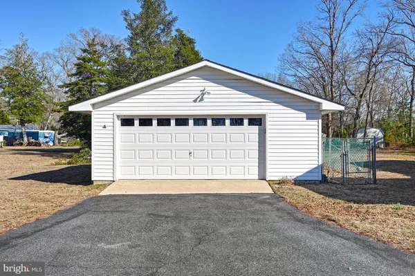 a front view of a house with a garage