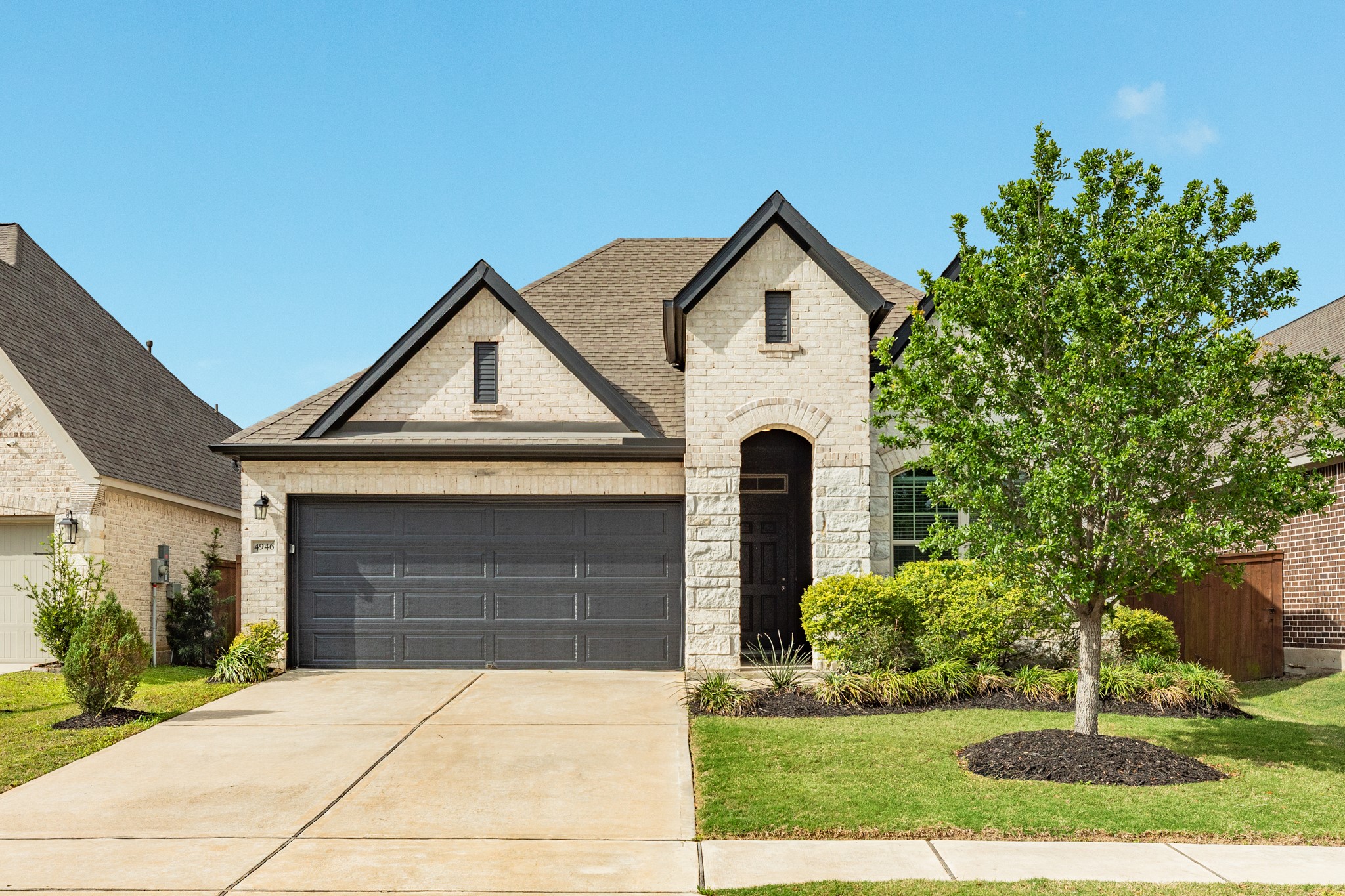 4946 Hitchings Court Rosharon, TX 77583 - Photo 1 of 49 Welcome home to this beautiful brick and stone single-story home on an oversized lot. This property offers a fantastic opportunity for comfortable living and outdoor enjoyment. The home's design and the expansive lot create a welcoming and desirable living space.