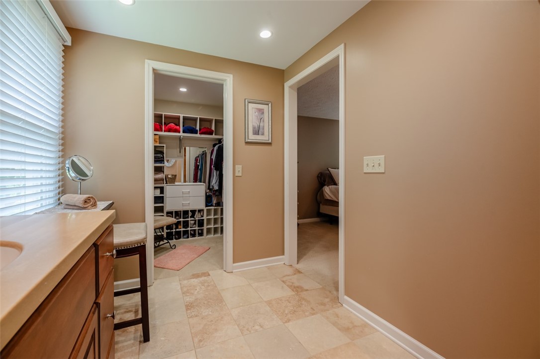 77 Misty Pine Road Perinton, NY 14450 - Photo 29 of 47 THE BATH/DRESSING AREA OPENS TO THE WALK-IN CLOSET