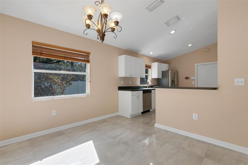 4557 Worcester Road Sarasota, FL 34231 - Photo 12 of 50 a view of kitchen with center island and stainless steel appliances