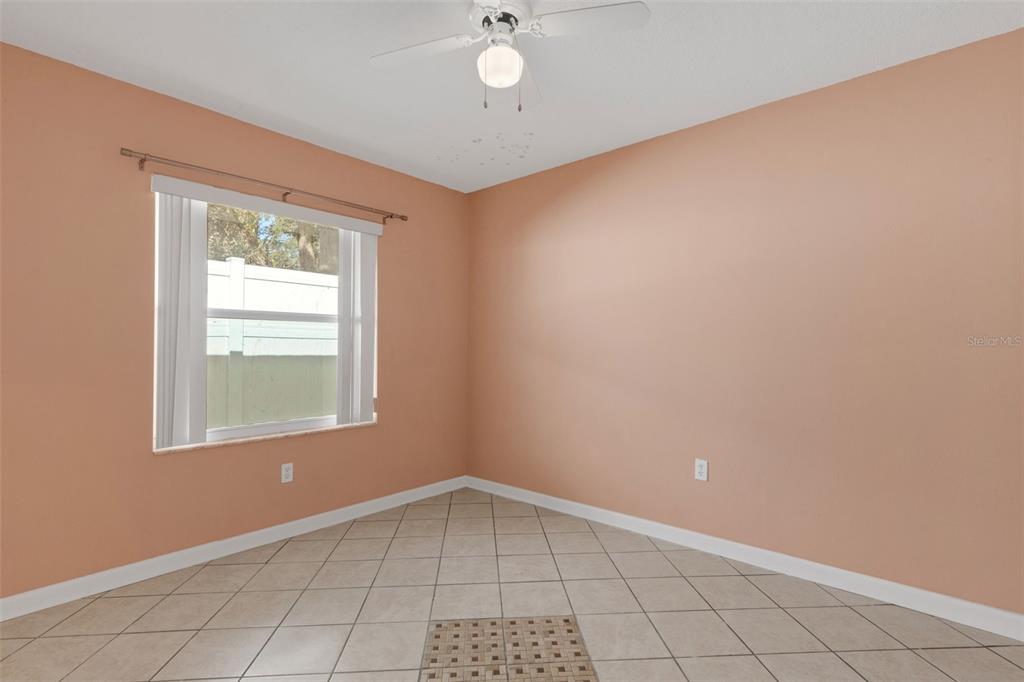 4557 Worcester Road Sarasota, FL 34231 - Photo 34 of 50 a view of an empty room with a window