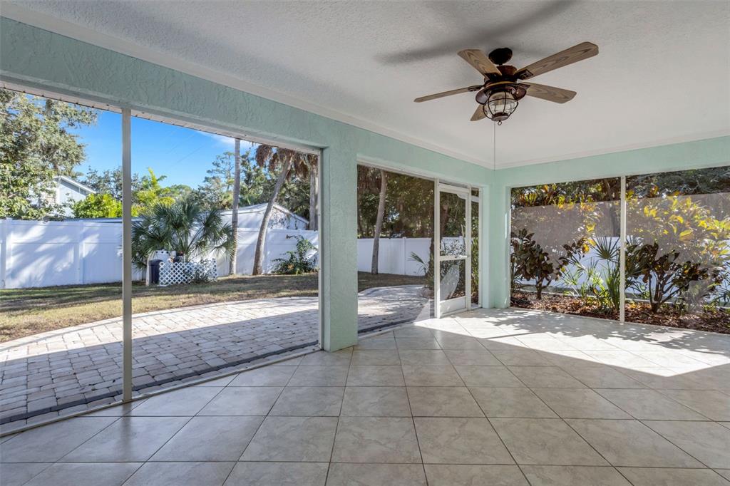 4557 Worcester Road Sarasota, FL 34231 - Photo 38 of 50 a view of a flesh screen tv and interior in a room