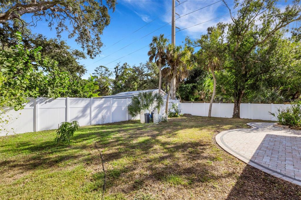 4557 Worcester Road Sarasota, FL 34231 - Photo 42 of 50 a view of a backyard with swimming pool
