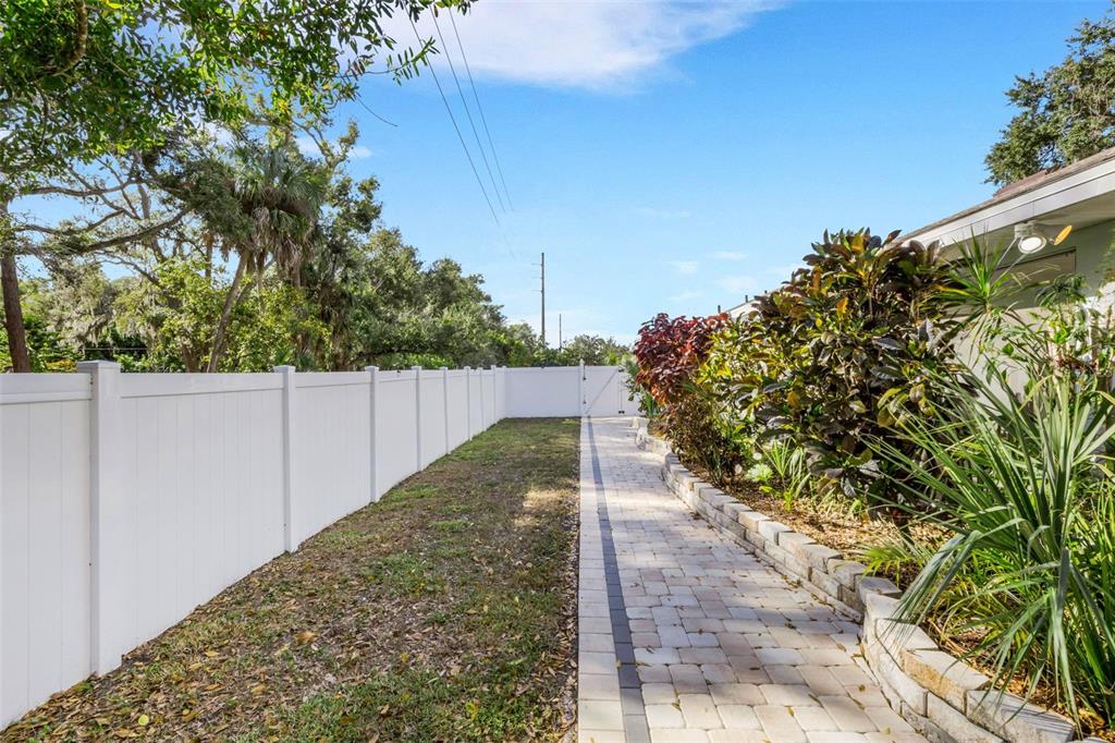 4557 Worcester Road Sarasota, FL 34231 - Photo 43 of 50 a view of a backyard