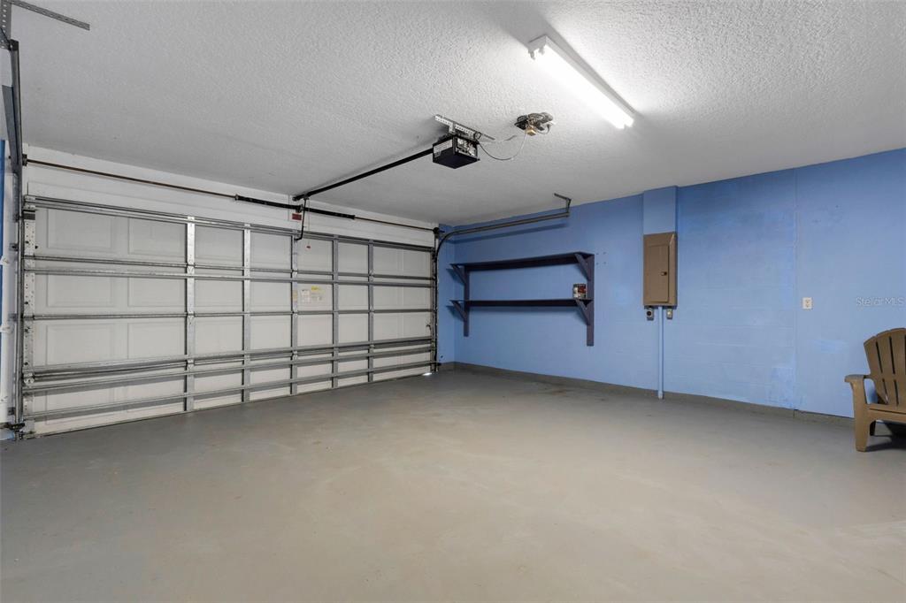 4557 Worcester Road Sarasota, FL 34231 - Photo 47 of 50 a view of a garage room and garage