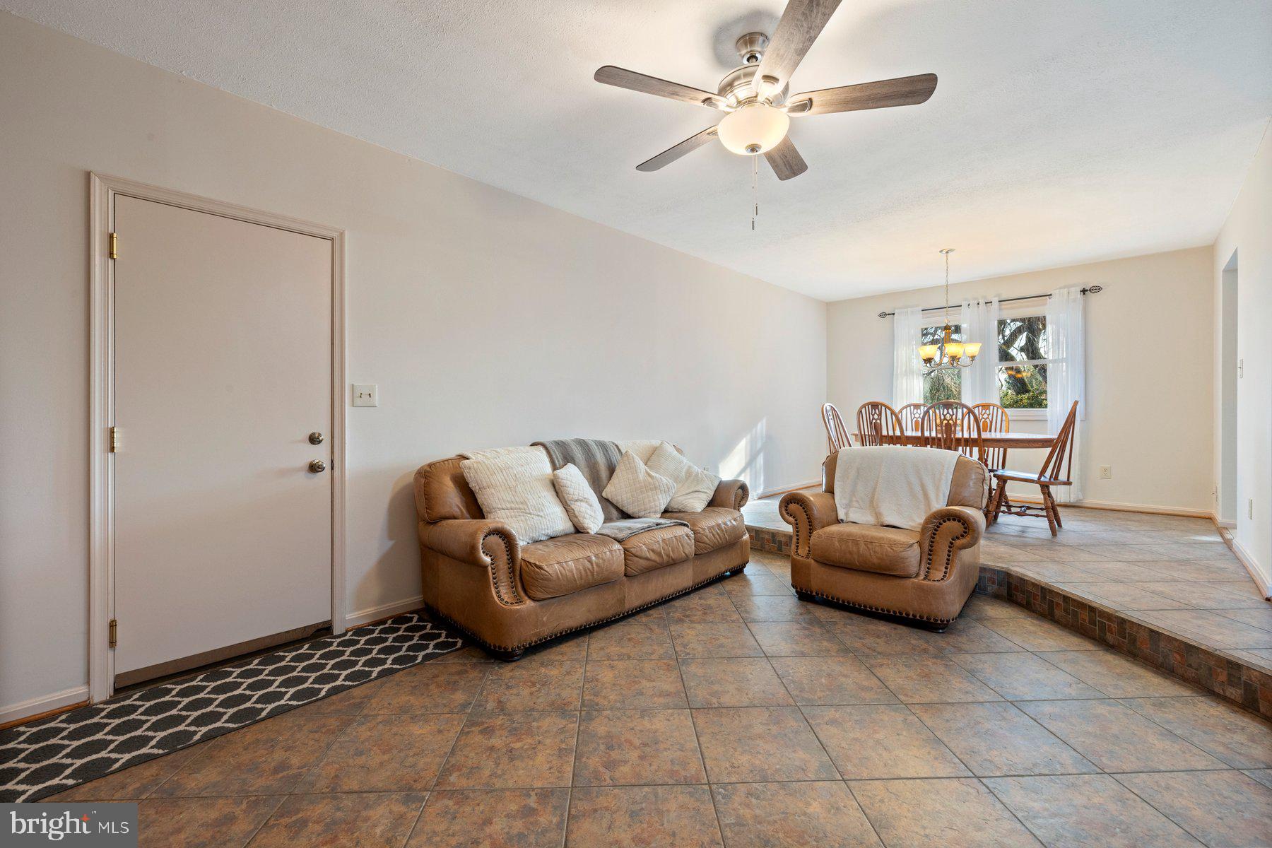 5130 Perry Road Mount Airy, MD 21771 - Photo 11 of 46 a living room with furniture and a ceiling fan