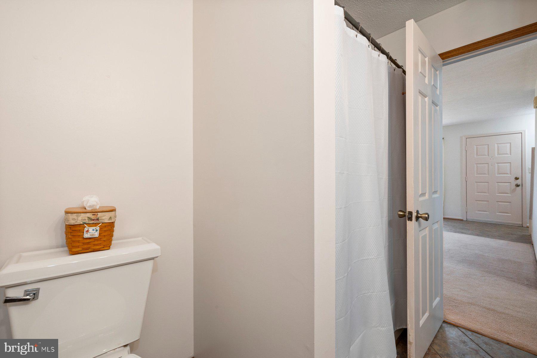 5130 Perry Road Mount Airy, MD 21771 - Photo 14 of 46 a bathroom with a toilet and a shower