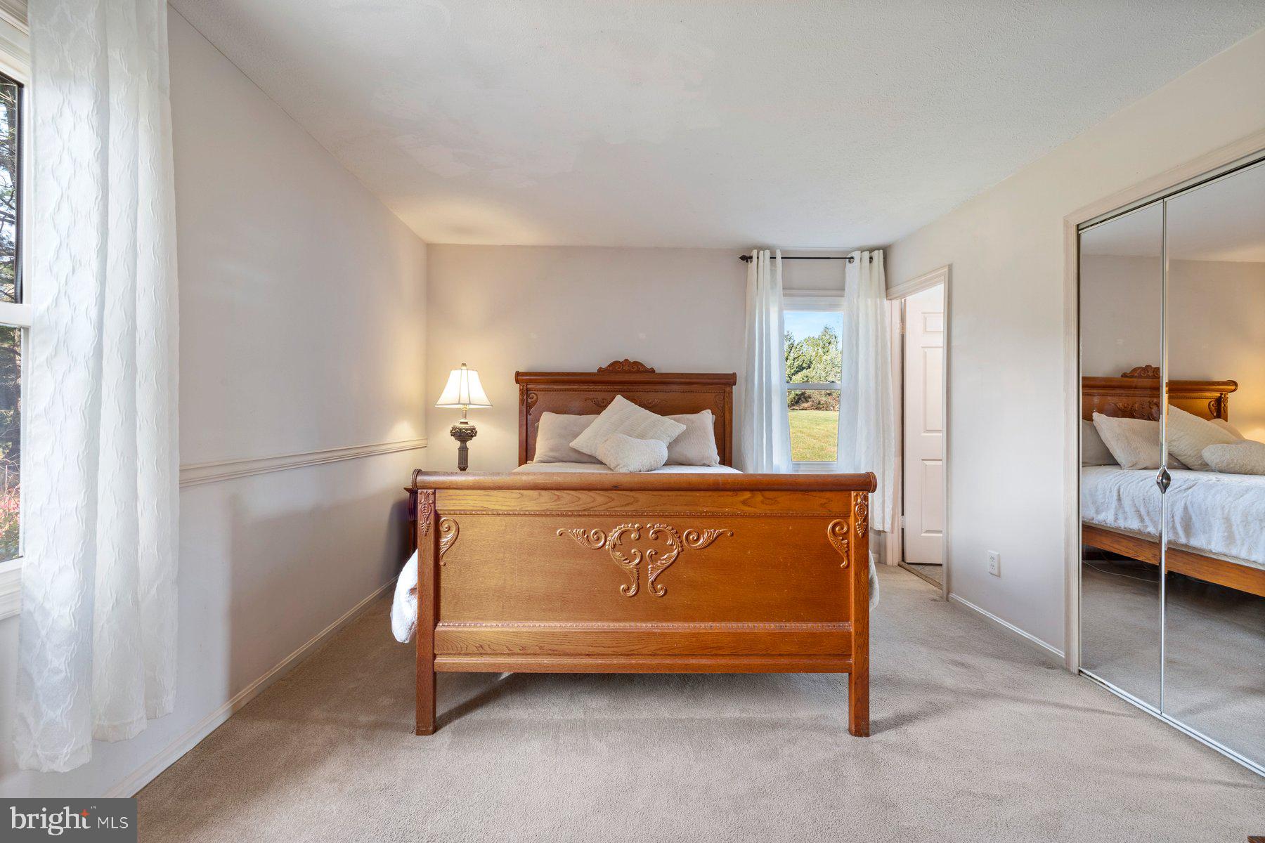 5130 Perry Road Mount Airy, MD 21771 - Photo 20 of 46 a bedroom with a bed and a cabinets