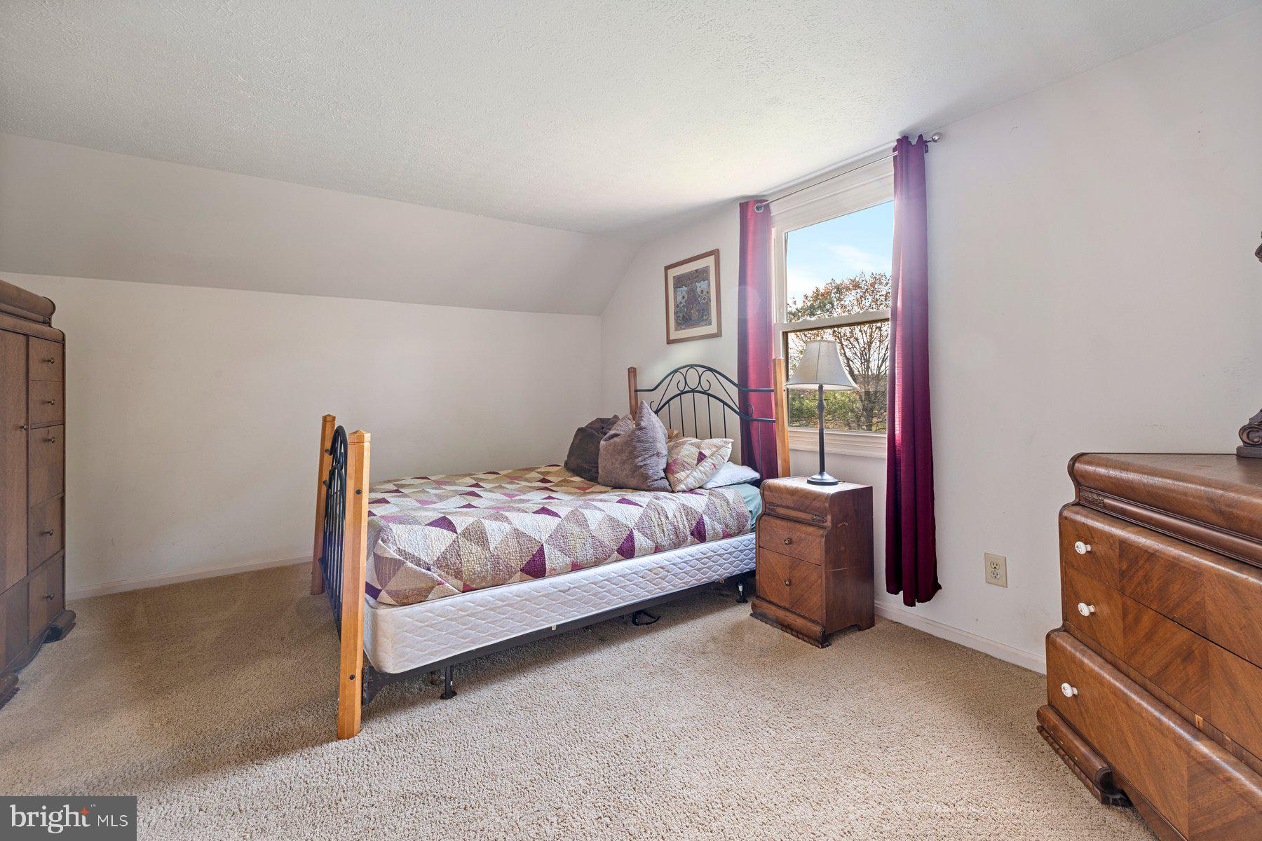 5130 Perry Road Mount Airy, MD 21771 - Photo 23 of 46 a bedroom with a bed and a window