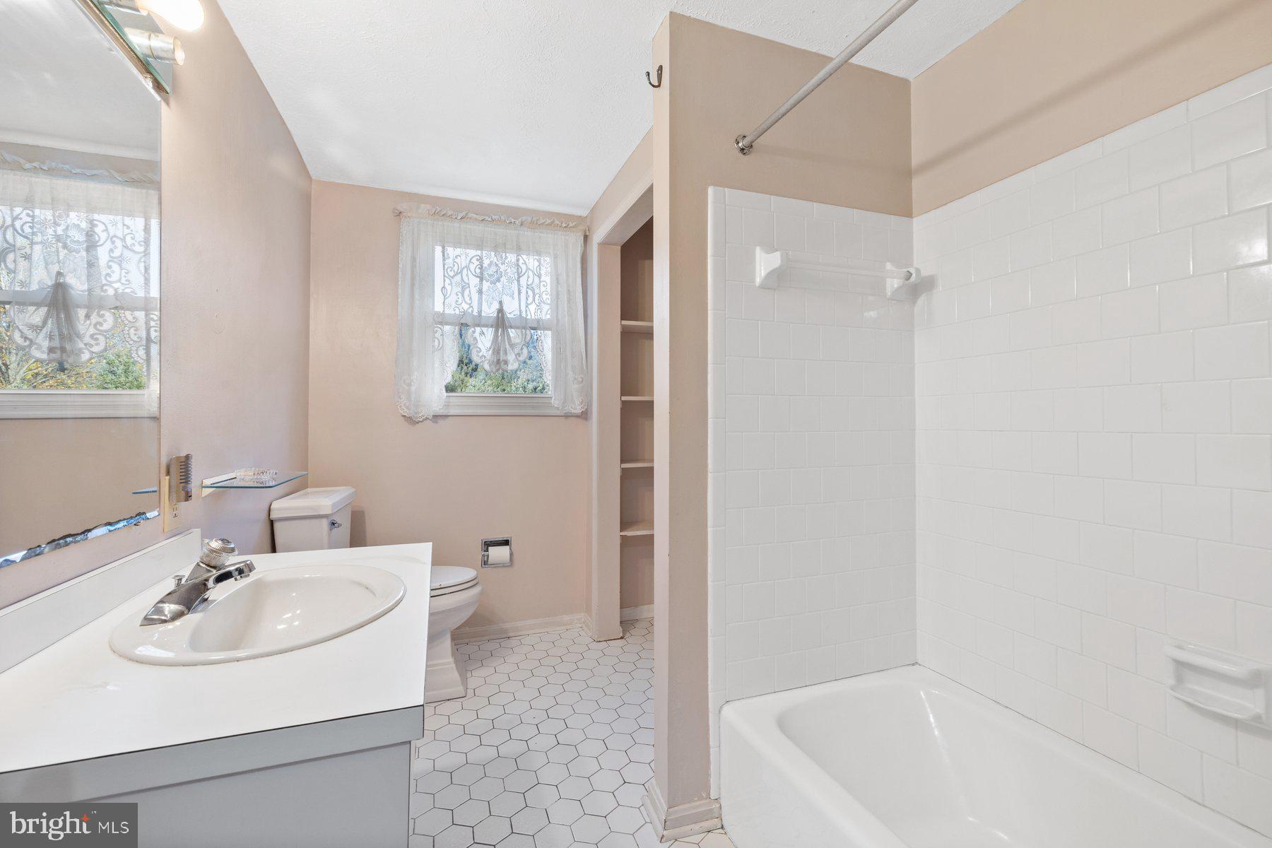 5130 Perry Road Mount Airy, MD 21771 - Photo 25 of 46 a bathroom with a sink a toilet and shower