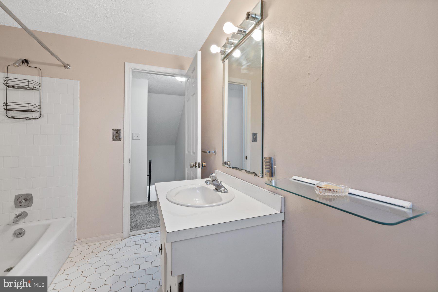 5130 Perry Road Mount Airy, MD 21771 - Photo 26 of 46 a bathroom with a sink a toilet and shower