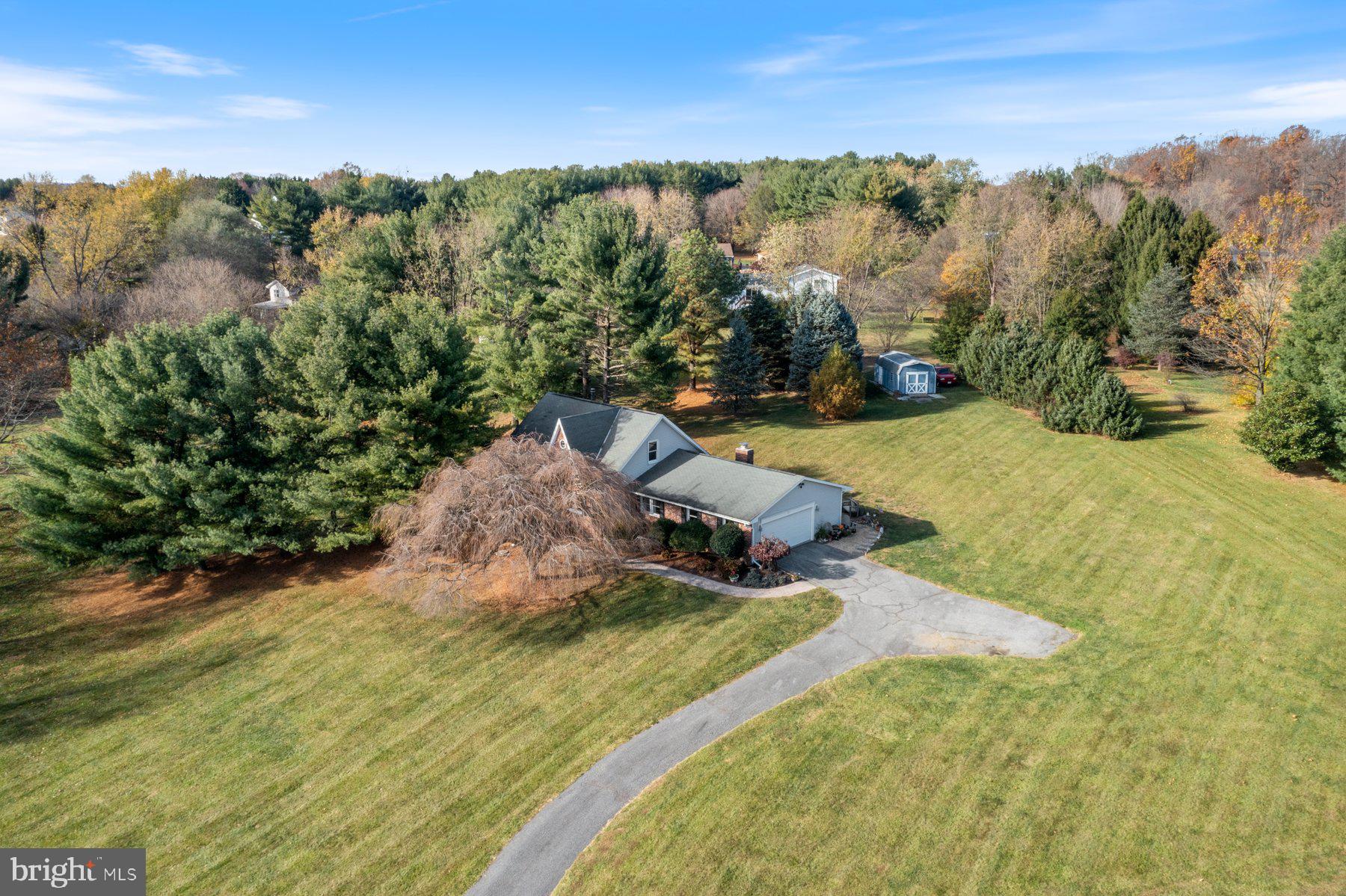 5130 Perry Road Mount Airy, MD 21771 - Photo 39 of 46 a backyard of a house with lots of green space