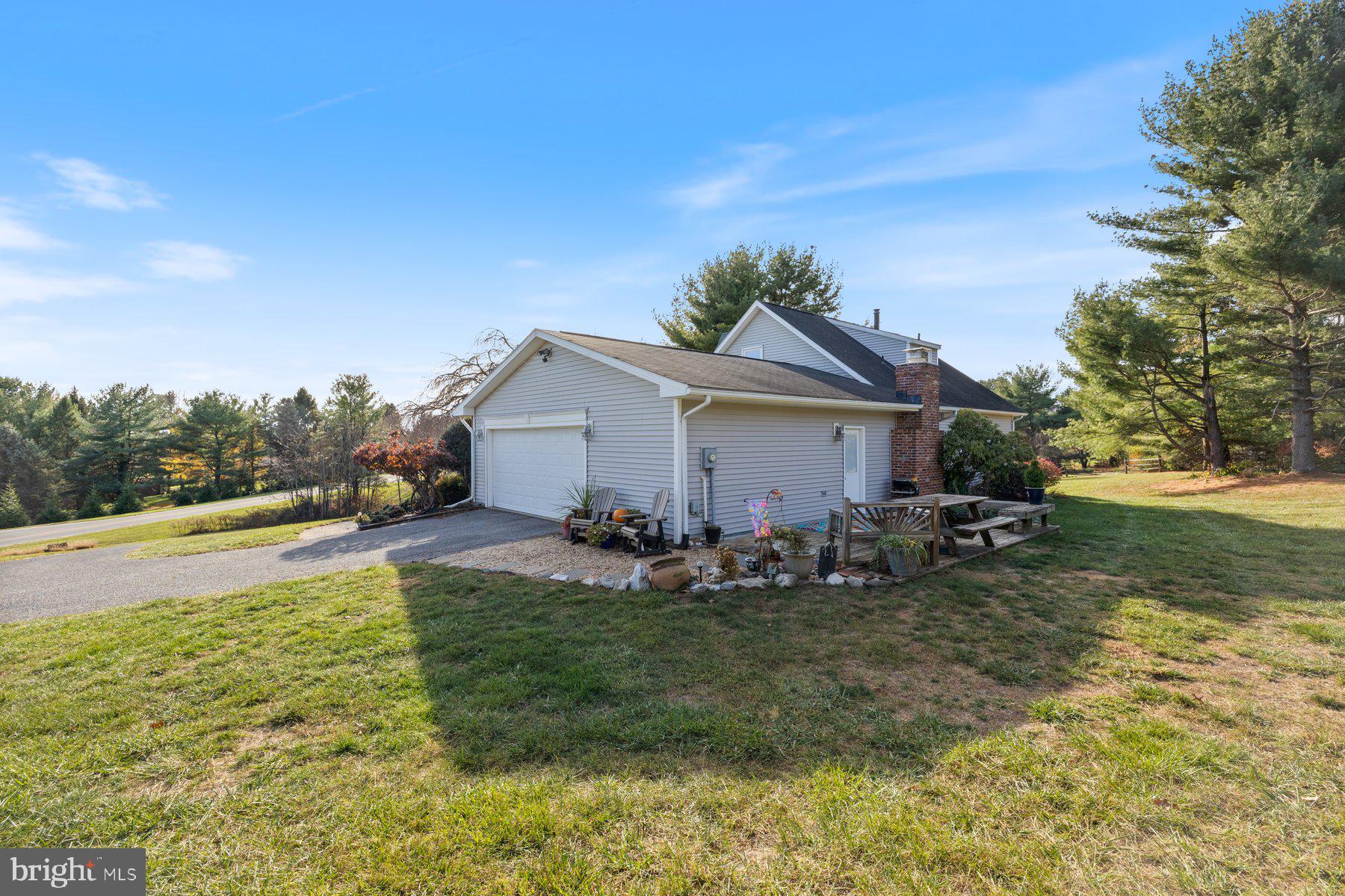 5130 Perry Road Mount Airy, MD 21771 - Photo 40 of 46 a view of a house with backyard and trees
