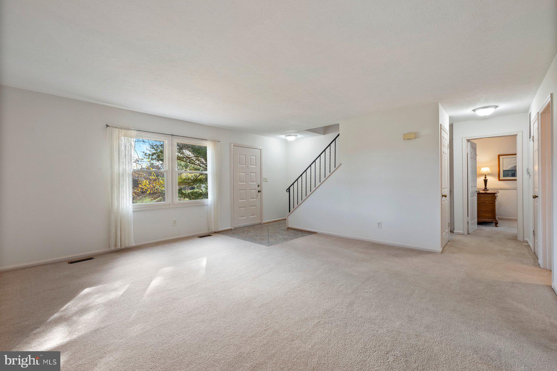 5130 Perry Road Mount Airy, MD 21771 - Photo 7 of 46 an empty room with windows and closet
