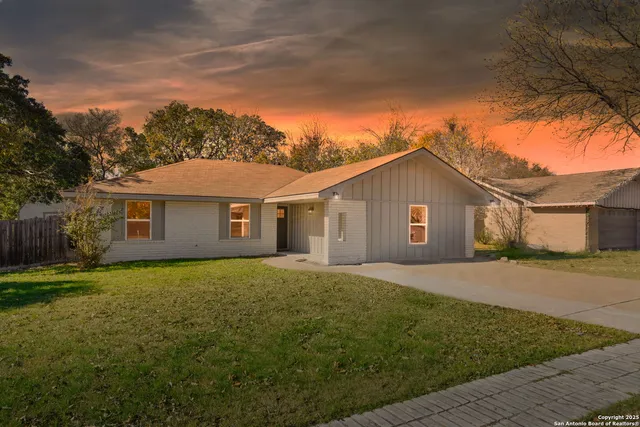a house view with a garden space
