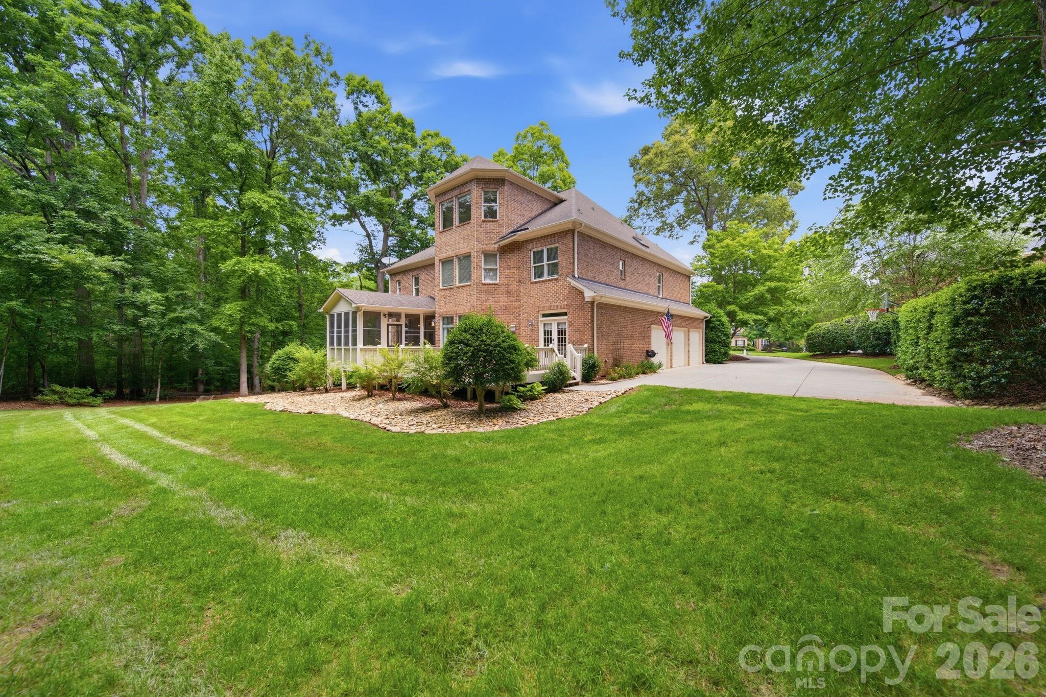 1802 Summit View Place Waxhaw, NC 28173 - Photo 43 of 47 a front view of a house with a yard