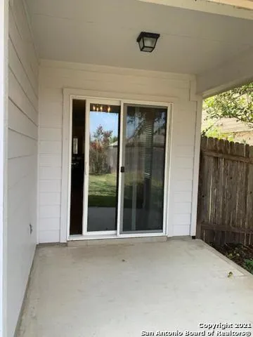 a view of a room with a large window