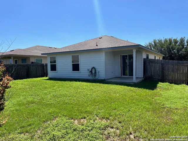 a house view with a garden space