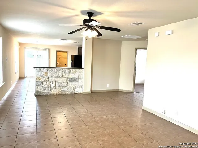 a view of hallway with a large mirror