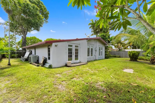 a view of a garden with a bench
