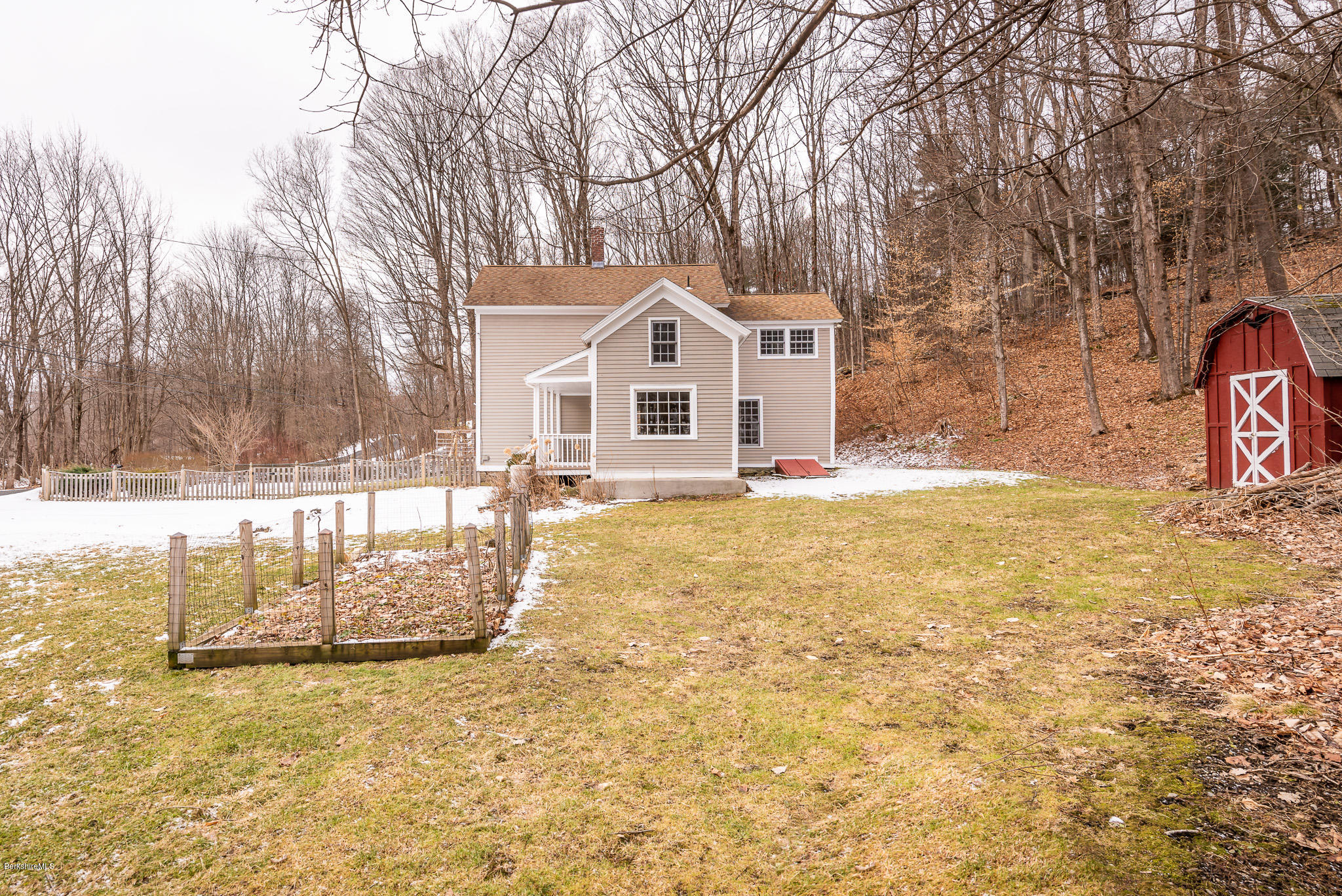 148 Cross Road Richmond, MA 01254 - Photo 5 of 26 a front view of a house with a yard covered with snow