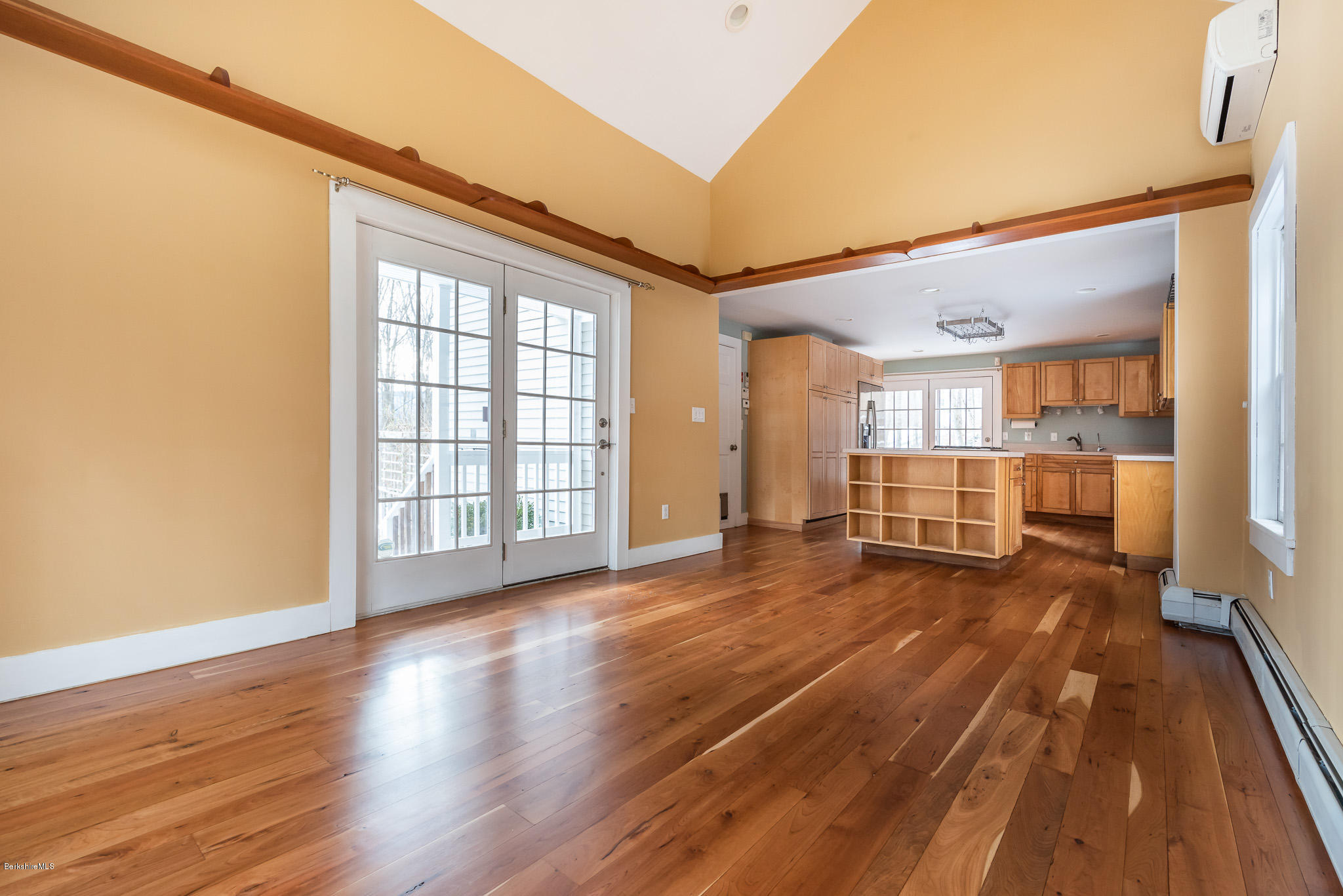 148 Cross Road Richmond, MA 01254 - Photo 10 of 26 a view of an empty room with wooden floor and a window