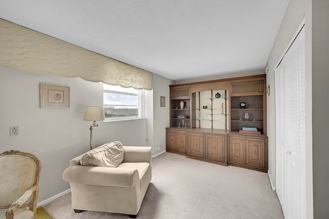 a living room with furniture and window