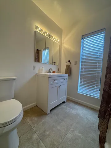 a car parked in front of a house