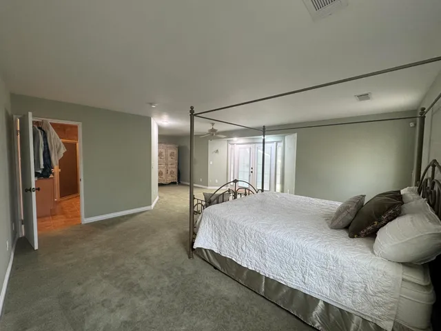 a view of a car parked in front of a house