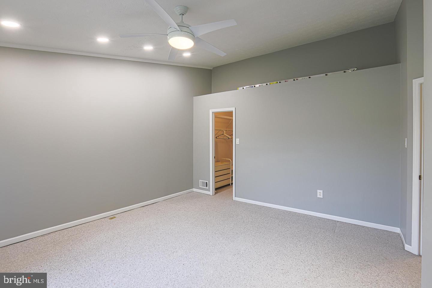 2734 Quarry Heights Way Baltimore, MD 21209 - Photo 13 of 25 an empty room with wooden floor