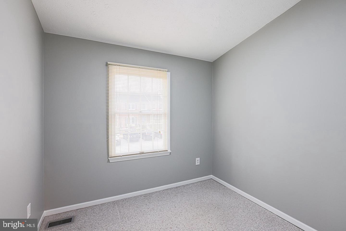 2734 Quarry Heights Way Baltimore, MD 21209 - Photo 17 of 25 an empty room with a window