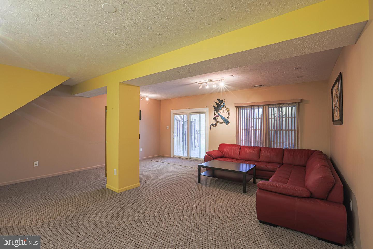 2734 Quarry Heights Way Baltimore, MD 21209 - Photo 19 of 25 a living room with furniture and a couch
