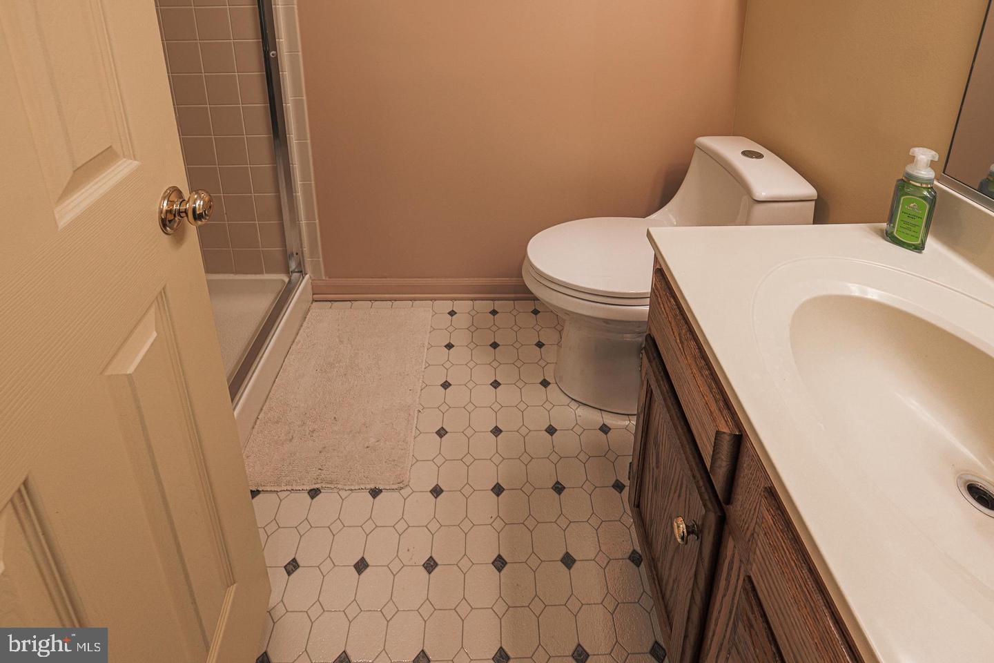 2734 Quarry Heights Way Baltimore, MD 21209 - Photo 21 of 25 a bathroom with a sink and toilet