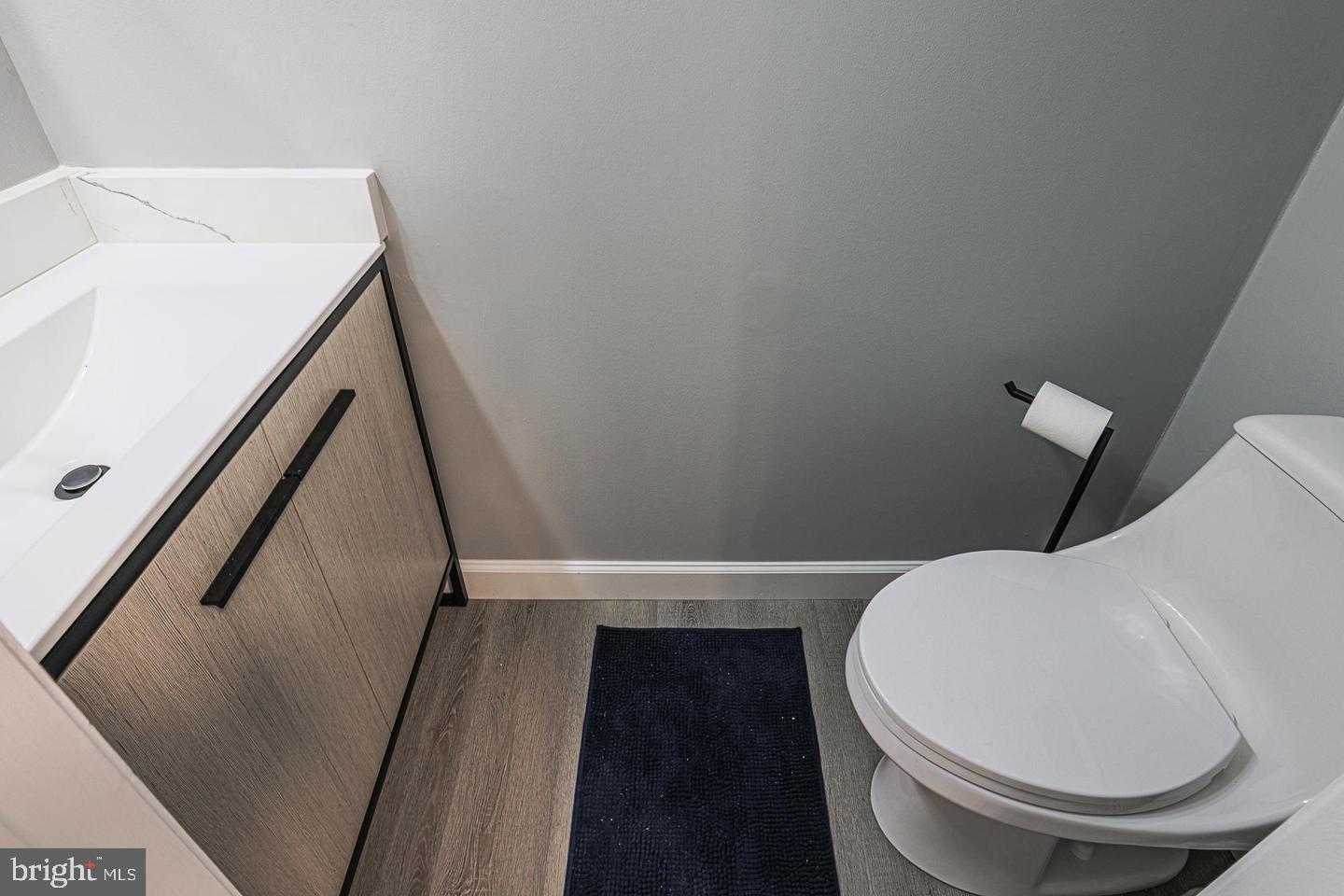 2734 Quarry Heights Way Baltimore, MD 21209 - Photo 10 of 25 a bathroom with a toilet and a mirror