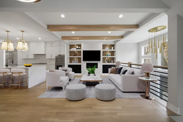 a living room with fireplace furniture and a flat screen tv