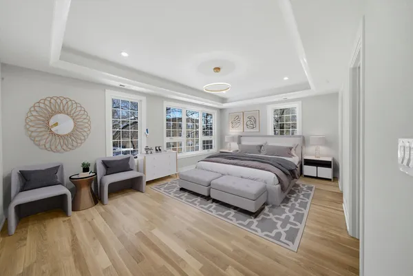 a bedroom with a bed and a table in it